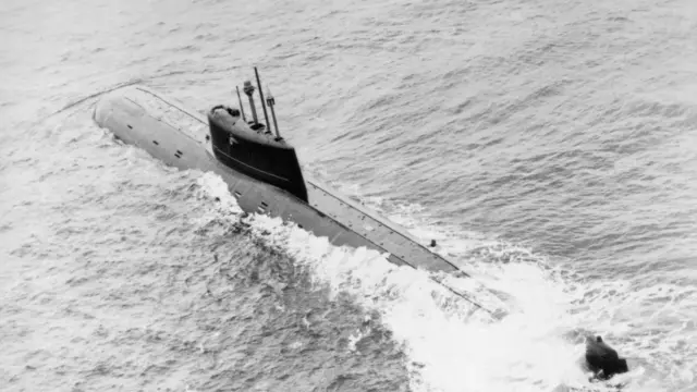 An aerial port quarter view of a Soviet Mike class nuclear-powered attack submarine underway.