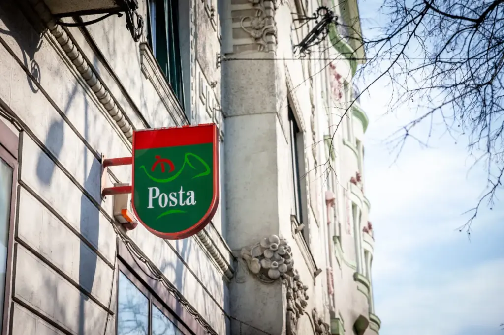 BUDAPEST, HUNGARY - FEBRUARY 27, 2022: Hungarian Post (also known as Magyar Posta) logo on one of their post offices. Magyar Posta is the postal administration of Hungary
