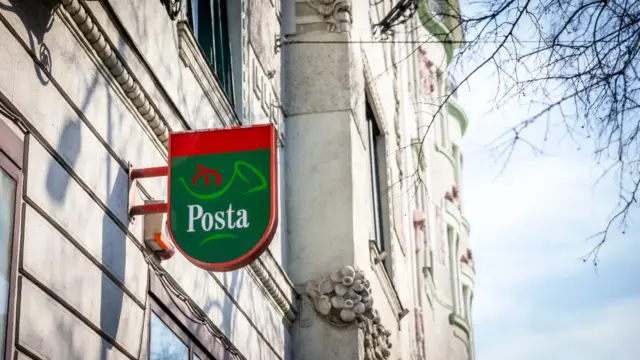 BUDAPEST, HUNGARY - FEBRUARY 27, 2022: Hungarian Post (also known as Magyar Posta) logo on one of their post offices. Magyar Posta is the postal administration of Hungary