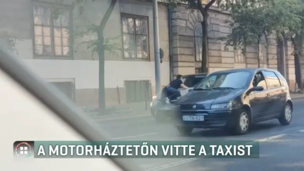 Motorháztetőn egy férfi az Üllői úton egy koccanás után – videóval